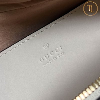 tui deo cheo nu gucci can chinh hang mau trang logo vang (6)